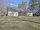 House exterior with grassy backyard at 33 Ball St, Moreland, GA 30259