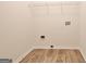 Clean laundry room with shelving unit at 33 Ball St, Moreland, GA 30259