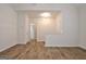 Bright living room with hardwood floors and neutral walls at 33 Ball St, Moreland, GA 30259