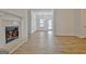 Bright living area with hardwood floors and a view to dining area at 33 Ball St, Moreland, GA 30259