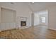 Spacious living room features a fireplace and hardwood floors at 33 Ball St, Moreland, GA 30259