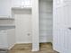 Bright kitchen pantry with ample shelving at 33 Ball St, Moreland, GA 30259