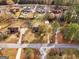 Aerial view of a house with a large backyard and surrounding trees at 735 Willow Bend Dr, Jonesboro, GA 30238