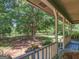 Peaceful front porch view overlooking a large yard at 950 Old Jackson Rd, Locust Grove, GA 30248