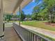 Front porch with views of neighborhood homes at 1302 Eddie Craig Ct, Mcdonough, GA 30252