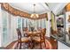 Bright breakfast nook with a charming table and window seating at 248 Montrose Dr, Mcdonough, GA 30253