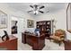 Home office with built-in shelving and comfortable chair at 248 Montrose Dr, Mcdonough, GA 30253