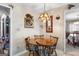 Cozy breakfast nook with a round table and four chairs at 75 Antioch Rd, Mcdonough, GA 30252