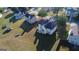 Aerial view of house, yard, and surrounding area at 30 Capeton Ct, Covington, GA 30016