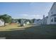 Large backyard with homes in background at 30 Capeton Ct, Covington, GA 30016