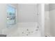 Relaxing bathroom with jetted tub and shower at 30 Capeton Ct, Covington, GA 30016
