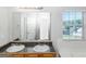 Double vanity bathroom with granite countertop at 30 Capeton Ct, Covington, GA 30016