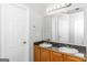 Bathroom with double vanity and granite countertop at 30 Capeton Ct, Covington, GA 30016