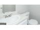 Clean bathroom with white vanity and toilet at 30 Capeton Ct, Covington, GA 30016