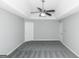 Bright bedroom featuring a ceiling fan and neutral decor at 30 Capeton Ct, Covington, GA 30016