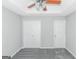Bedroom with double doors and ceiling fan at 30 Capeton Ct, Covington, GA 30016