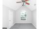 Bedroom with vaulted ceiling, ceiling fan and window at 30 Capeton Ct, Covington, GA 30016