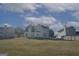Two-story house with backyard and large green space at 30 Capeton Ct, Covington, GA 30016