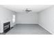 Living room with fireplace and grey carpeting at 30 Capeton Ct, Covington, GA 30016