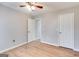 Bright bedroom with ceiling fan and double door closet at 5488 Britton Dr, Villa Rica, GA 30180