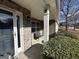 Inviting front porch with stone facade and comfortable seating at 3129 Oak Ridge Ln, Loganville, GA 30052