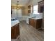 Kitchen with wood cabinets and quartz countertops at 362 Summer Hill Cir, Stockbridge, GA 30281