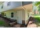 Unfinished basement with stone accents and exterior access at 4694 E Glen Ridge Cir, Winston, GA 30187