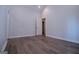 Bright bedroom featuring light walls and wood-look vinyl flooring at 4694 E Glen Ridge Cir, Winston, GA 30187