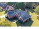 Aerial view of home; brick exterior, landscaping at 1000 Maria Dr, Mcdonough, GA 30253