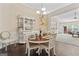 Formal dining room with a charming hutch and hardwood floors at 1611 Stillriver Run Dr, Mcdonough, GA 30252