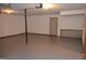 Spacious garage with painted floor and ample storage space at 5475 Pepperwood Ct, Stone Mountain, GA 30087