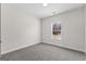 Simple bedroom with neutral carpeting and window at 278 Deer Creek Run # 3-12, Moreland, GA 30259