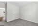 Well-lit bedroom with neutral carpeting and closet at 278 Deer Creek Run # 3-12, Moreland, GA 30259