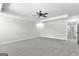 Spacious bedroom with ceiling fan and carpet at 278 Deer Creek Run # 3-12, Moreland, GA 30259