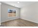 Bright bedroom with large window and neutral carpeting at 278 Deer Creek Run # 3-12, Moreland, GA 30259