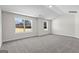 Large bedroom with grey carpet and two windows with scenic views at 278 Deer Creek Run # 3-12, Moreland, GA 30259