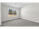 Bright bedroom with large window and carpet at 278 Deer Creek Run # 3-12, Moreland, GA 30259