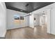 Bright dining room with large window, chandelier, and hardwood floors at 278 Deer Creek Run # 3-12, Moreland, GA 30259