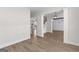 Open hallway view of living room, dining area, and staircase at 278 Deer Creek Run # 3-12, Moreland, GA 30259