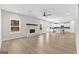 Open living room with a fireplace and kitchen views at 278 Deer Creek Run # 3-12, Moreland, GA 30259