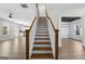 Elegant staircase with light wood and white railings at 278 Deer Creek Run # 3-12, Moreland, GA 30259