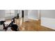 Hardwood floor dining room with Peloton exercise bike at 427 Blackbird Way, Hampton, GA 30228