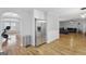 Modern kitchen features stainless steel appliances and white shaker cabinets at 427 Blackbird Way, Hampton, GA 30228