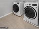 Bright laundry room with washer and dryer at 427 Blackbird Way, Hampton, GA 30228