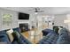 Spacious living area with sectional sofa and open concept design at 427 Blackbird Way, Hampton, GA 30228