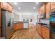 Kitchen with stainless steel appliances and hardwood floors at 500 Poplar Creek Xing, Canton, GA 30114