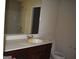 Bathroom with a vanity, toilet, and bathtub at 552 Moline Way, Locust Grove, GA 30248