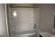 Bathroom with shower/tub combo and built-in shelves at 552 Moline Way, Locust Grove, GA 30248