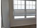 Bright bedroom featuring a large window with blinds at 552 Moline Way, Locust Grove, GA 30248