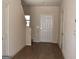 Entryway with stairs and a white front door at 552 Moline Way, Locust Grove, GA 30248